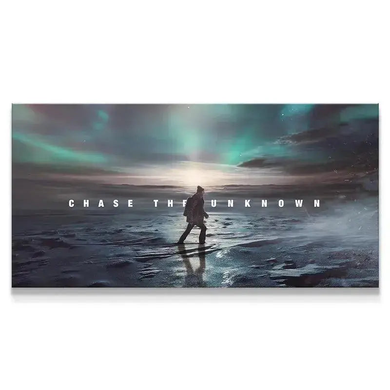 Full panoramic view of the 'Chase The Unknown' art showing the lone figure walking toward the sunlit horizon.