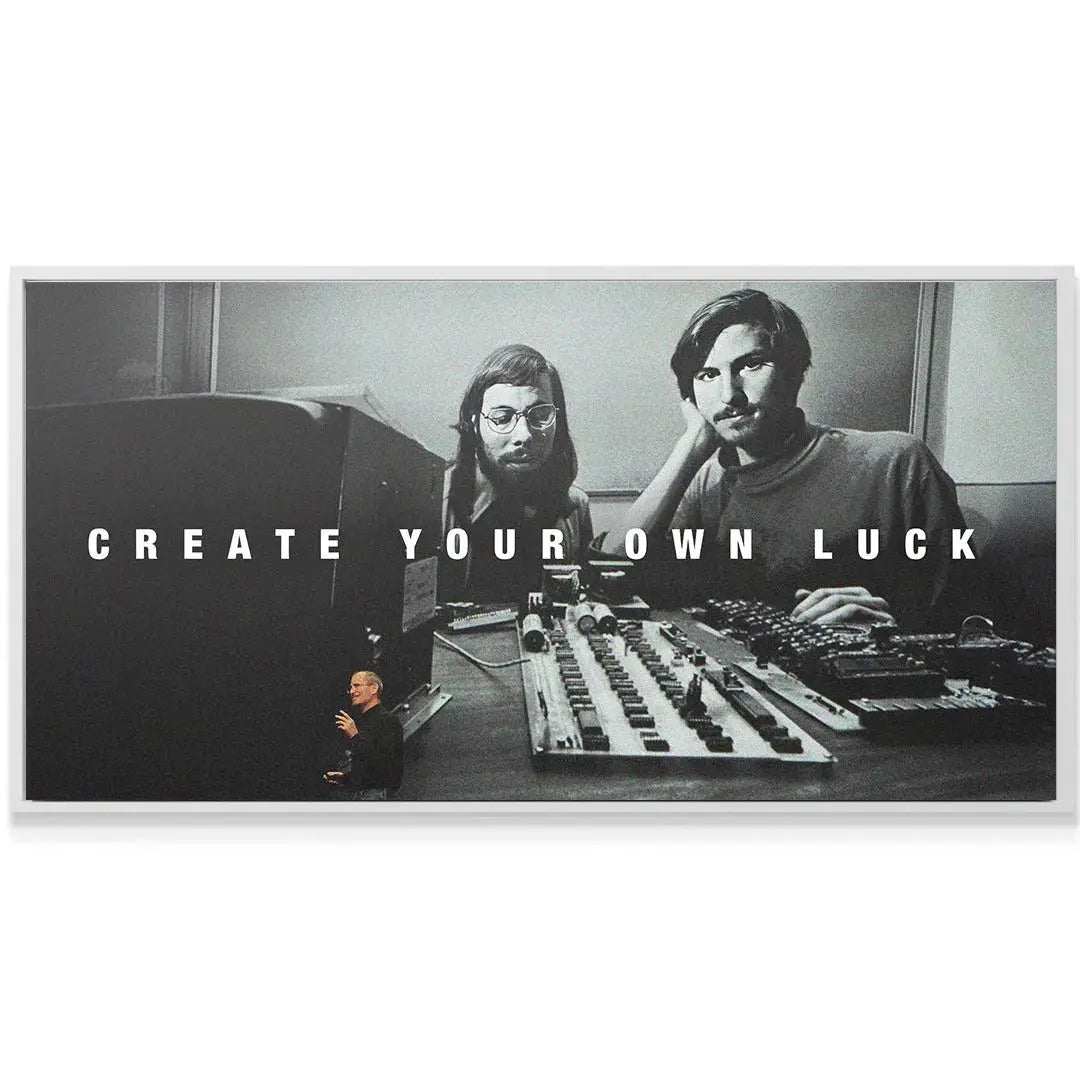 Lifestyle shot of the 'Create Your Own Luck' print mounted above a sleek modern executive desk, inspiring ambition.