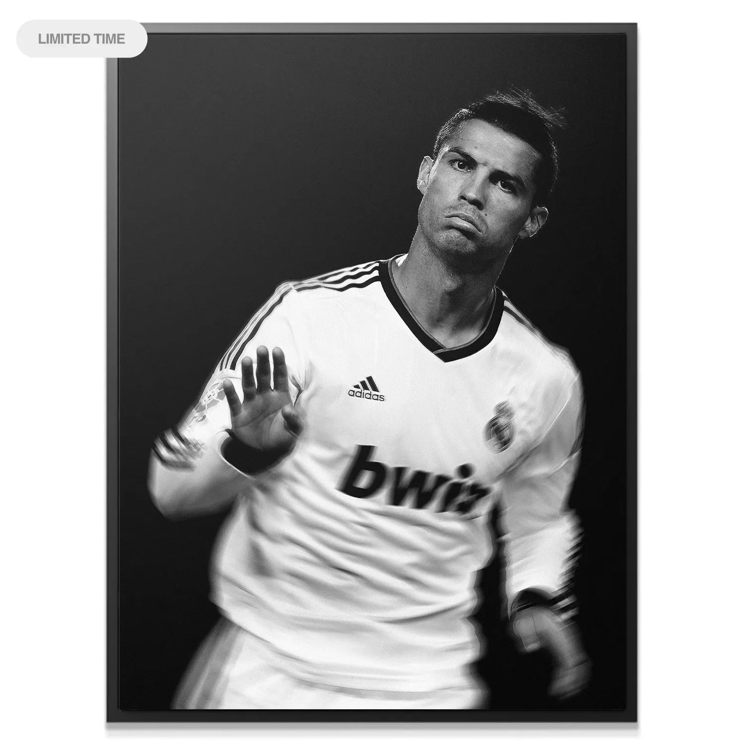 Black and white motion blur shot of Cristiano Ronaldo - Calma gesture on the field.