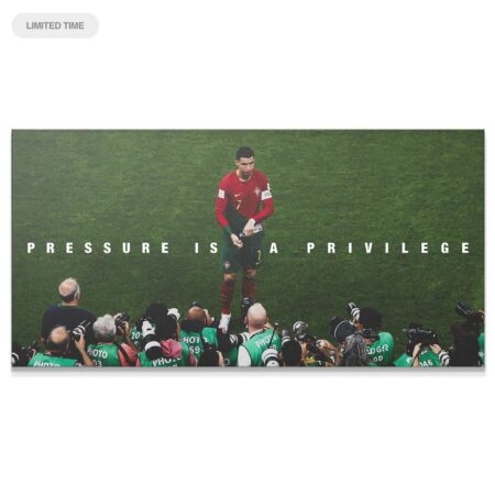 Wide-angle canvas art showing Cristiano Ronaldo - Pressure Is A Privilege on a football pitch surrounded by camera crews and photographers.