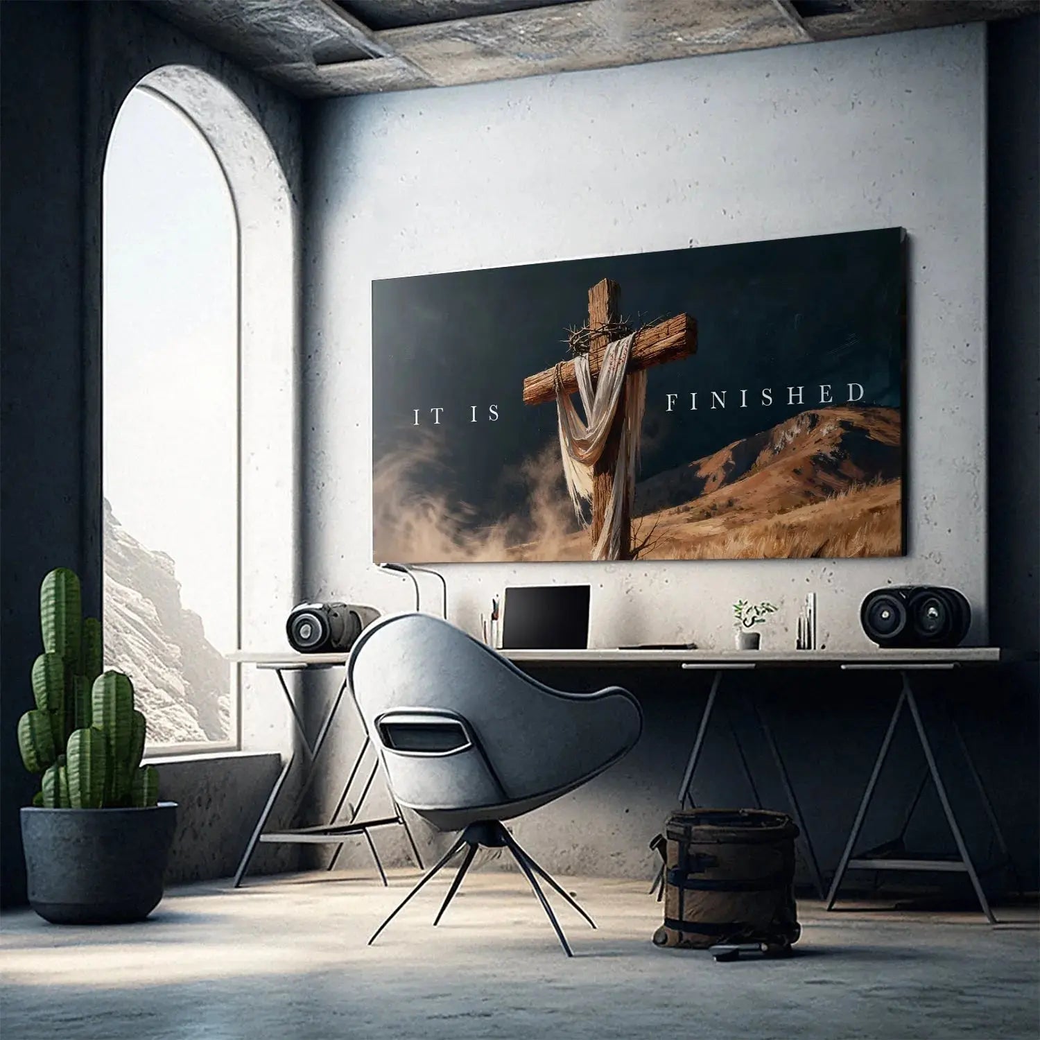Wide shot showing the Golgotha landscape and desert setting surrounding the 'Cross – It Is Finished' art.