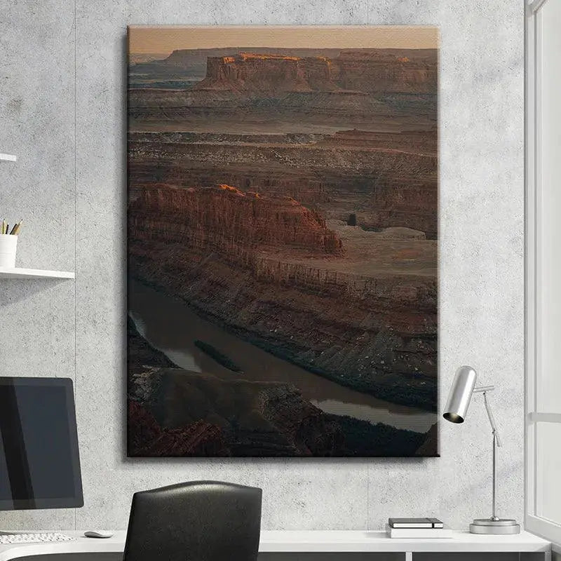 Golden hour sunlight illuminating the highest mesa edges in the Dead Man's Land photograph.