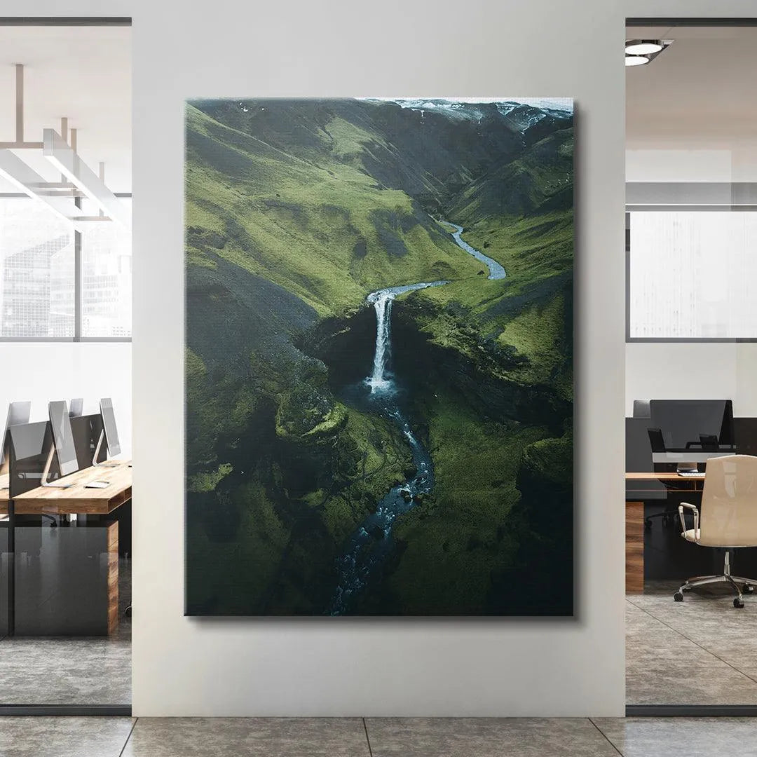 DJI perspective showing texture of the mossy, rugged mountain slopes and dark rock.