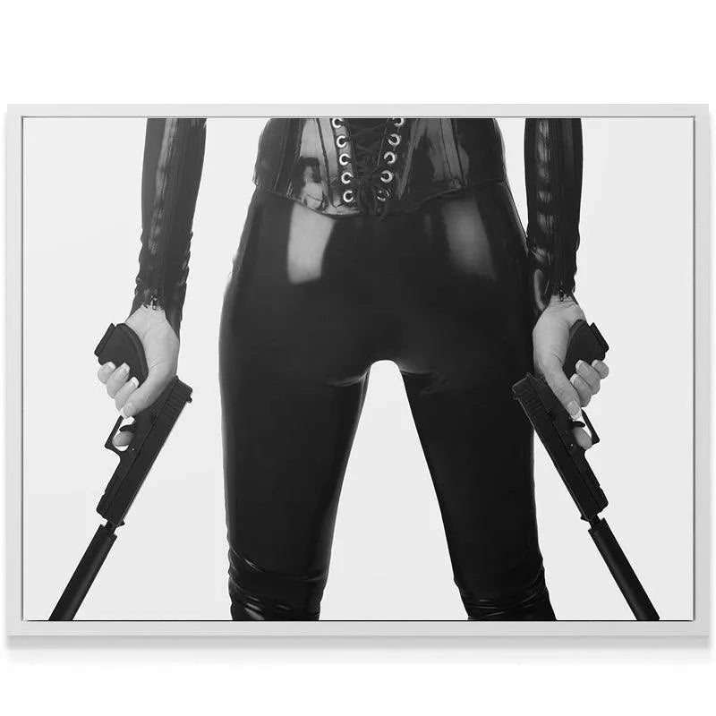 Left hand holding the firearm with suppressor, defining the spy theme of 'Double Trouble'.
