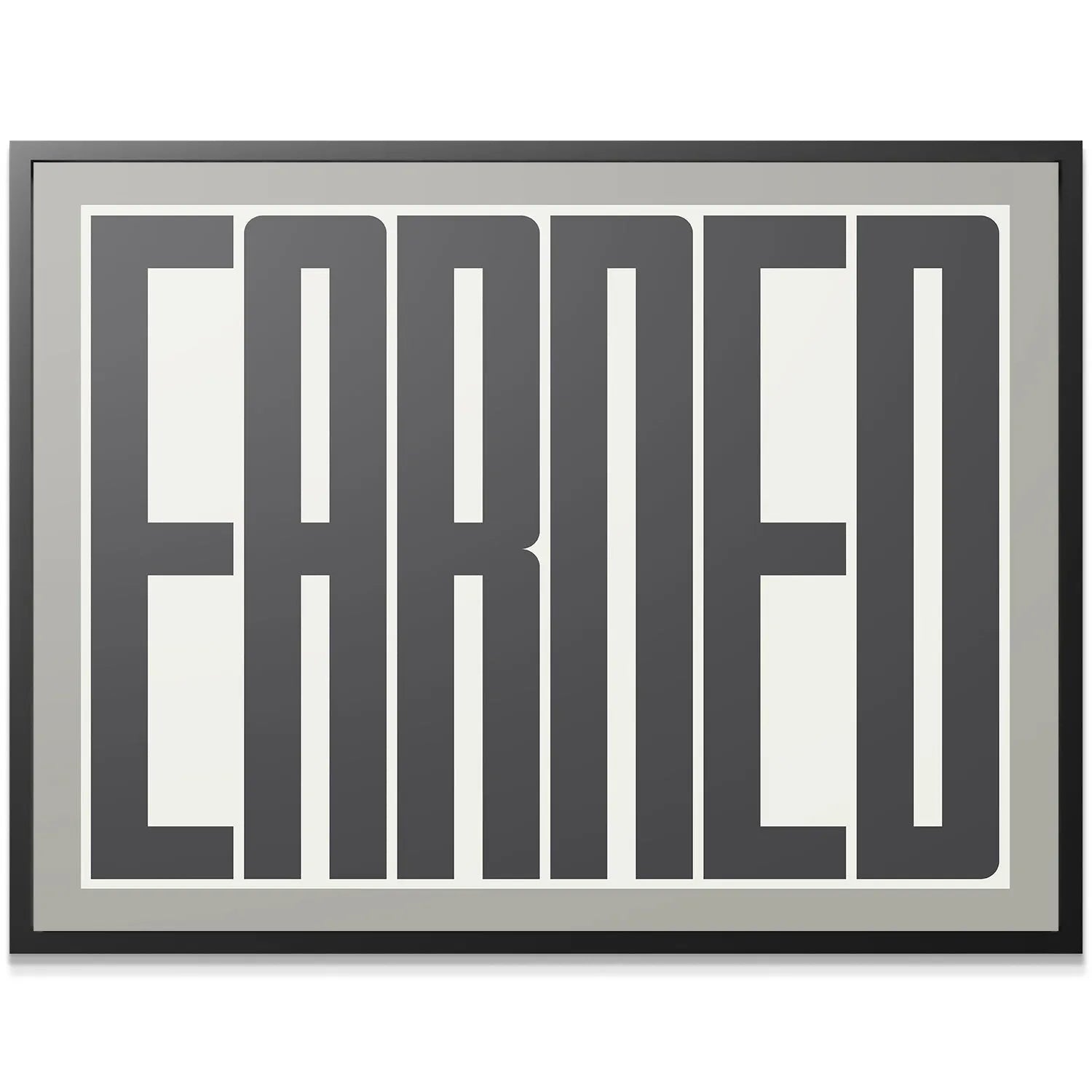 Close-up detail showing the crisp texture of the high-contrast 'Earned' lettering on the canvas.
