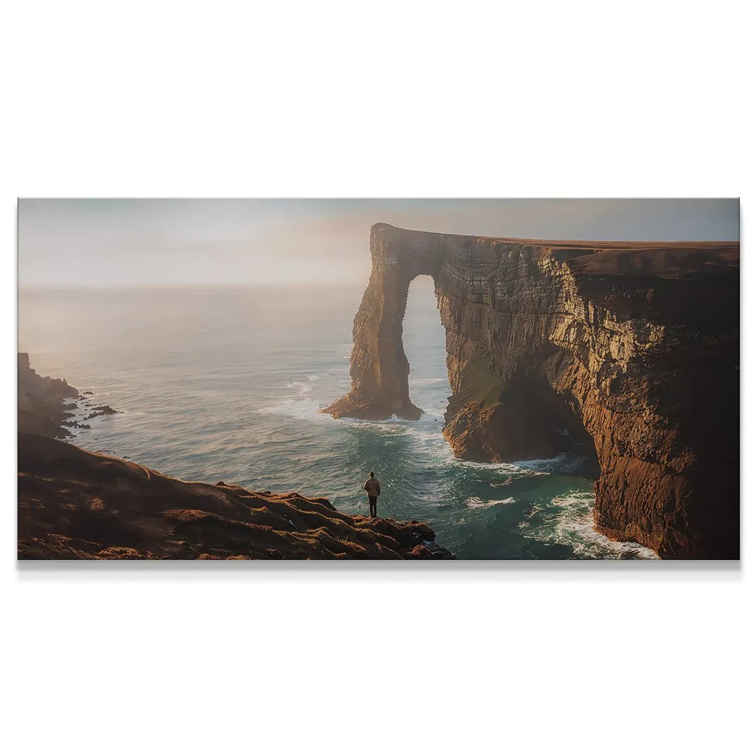 Wide shot of natural sea arch at sunset, emphasizing scale and solitude: Everything Happens For A Reason (No Quote).