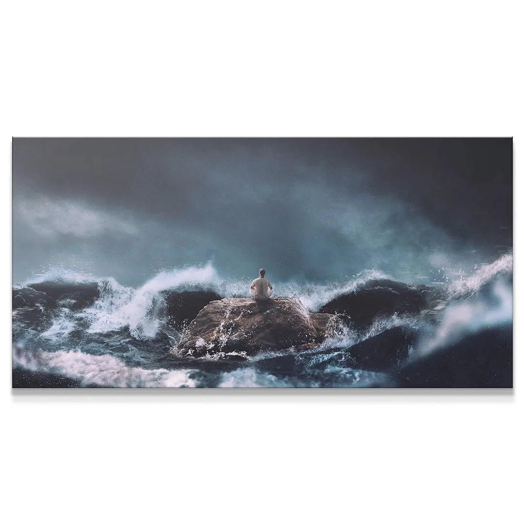Find Calm In The Chaos (No Quote) wide landscape view of figure on rock surrounded by turbulent ocean waves.