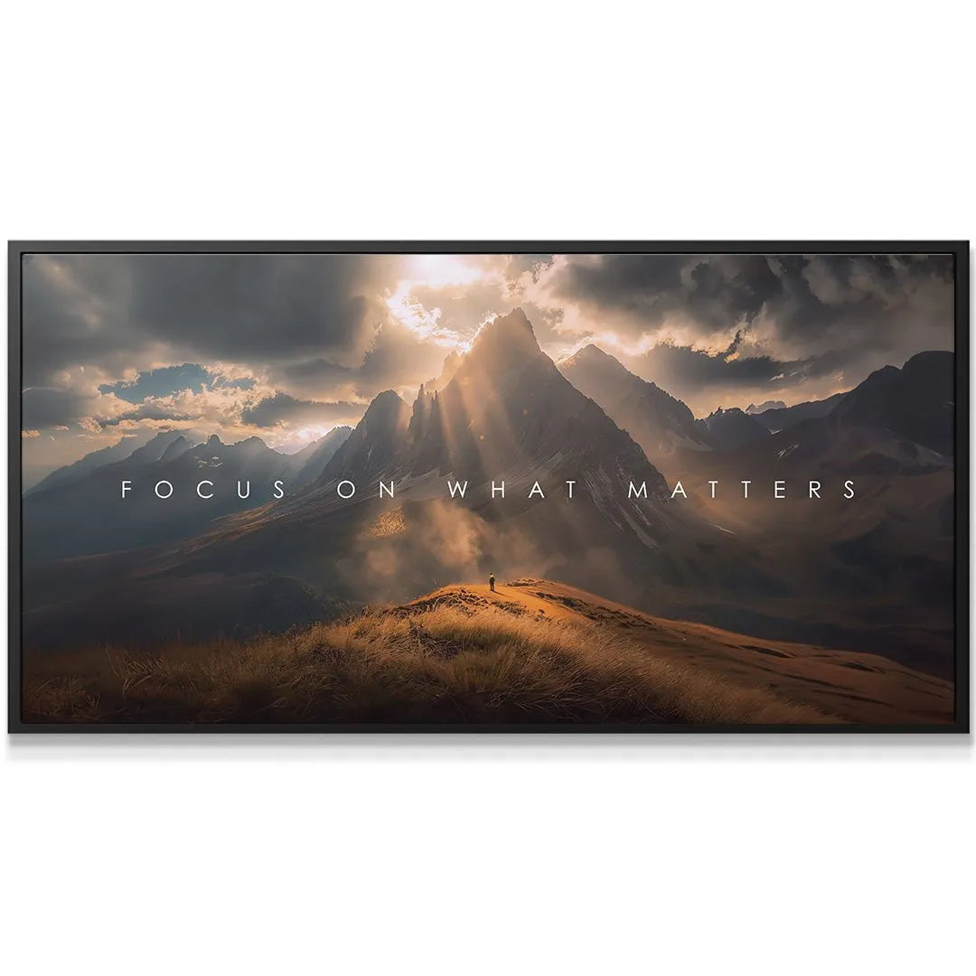 Close-up on golden grassy hill where a figure stands under text "Focus On What Matters"