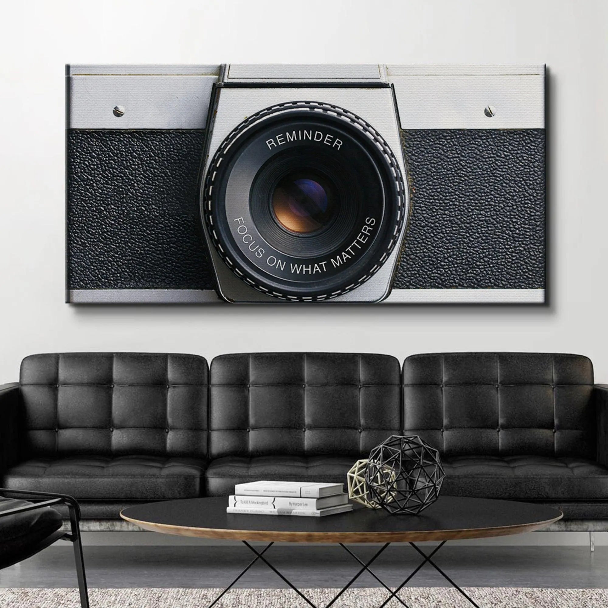 High-contrast profile of the analog 'Focus On What Matters (Camera)' against a stark, bright background.