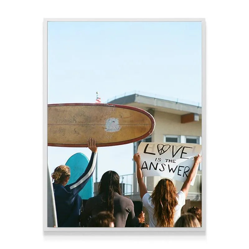 Detailed vintage texture of the aged wooden surfboard held aloft in the Give Love artwork.
