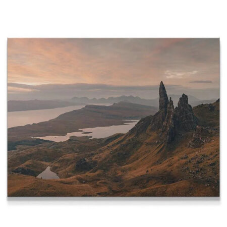 Panoramic view of 'Glimpse of Storr' showing the wide valley and distant lochs under sunset clouds.