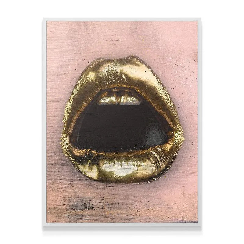 Lifestyle shot of Gold Lips artwork displayed above a sleek, modern sofa.