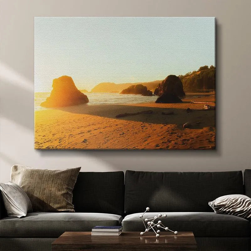 Vertical shot emphasizing the height of the largest rock formation silhouetted against the bright 'Golden Glow' sky.