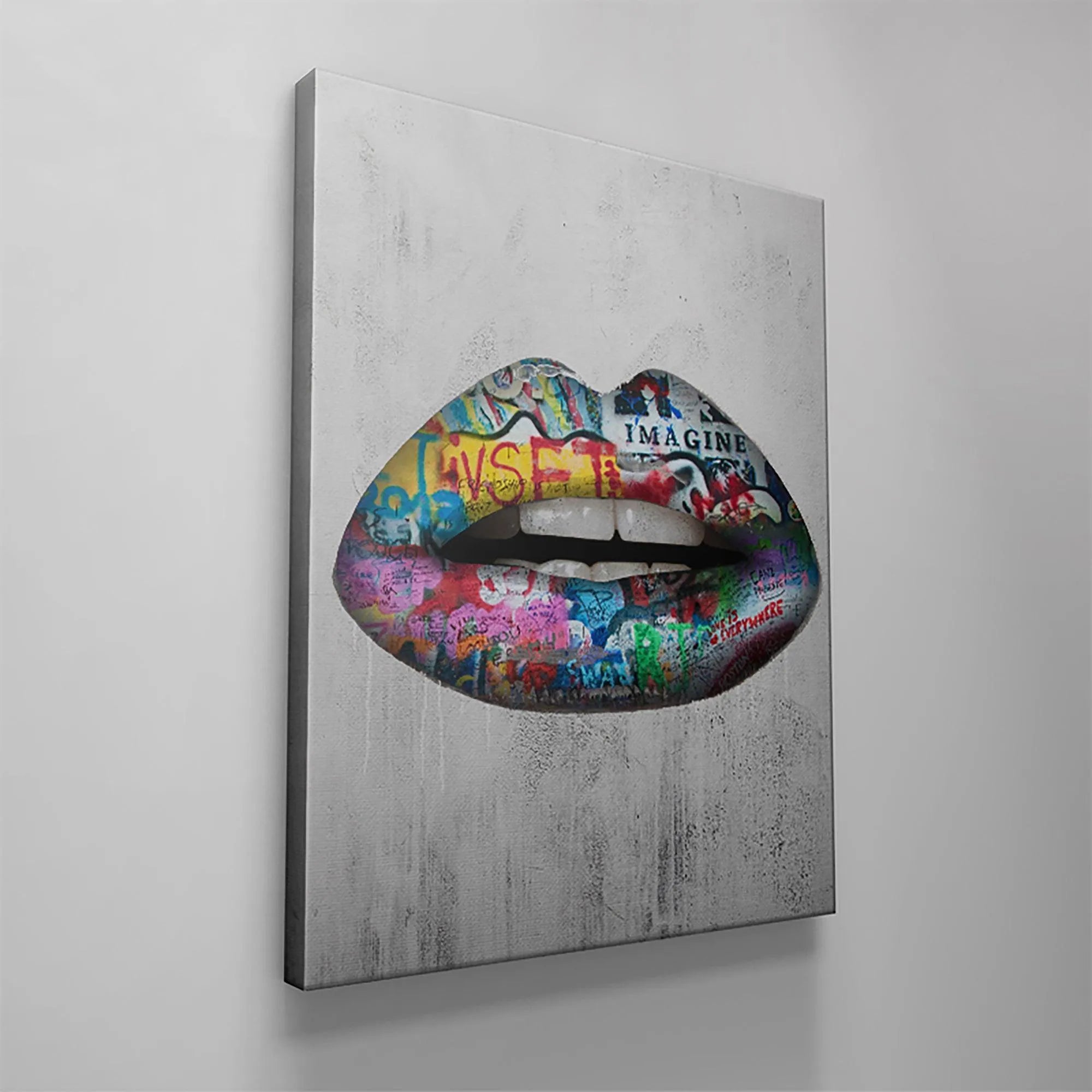 Lifestyle shot displaying the large format Graffiti Lips art hanging above a modern minimalist sofa.