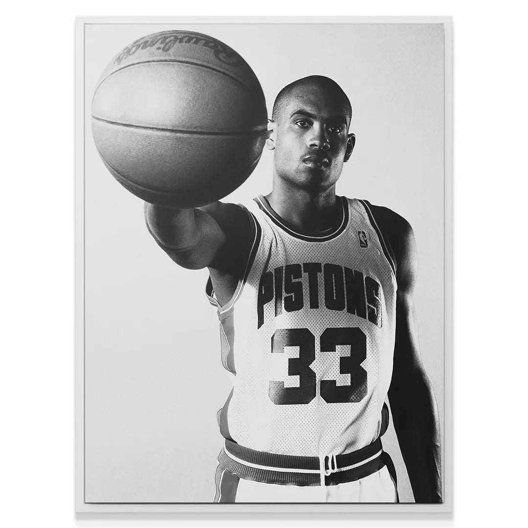High-contrast studio angle of NBA icon Grant Hill - #2 focused intently on the camera.