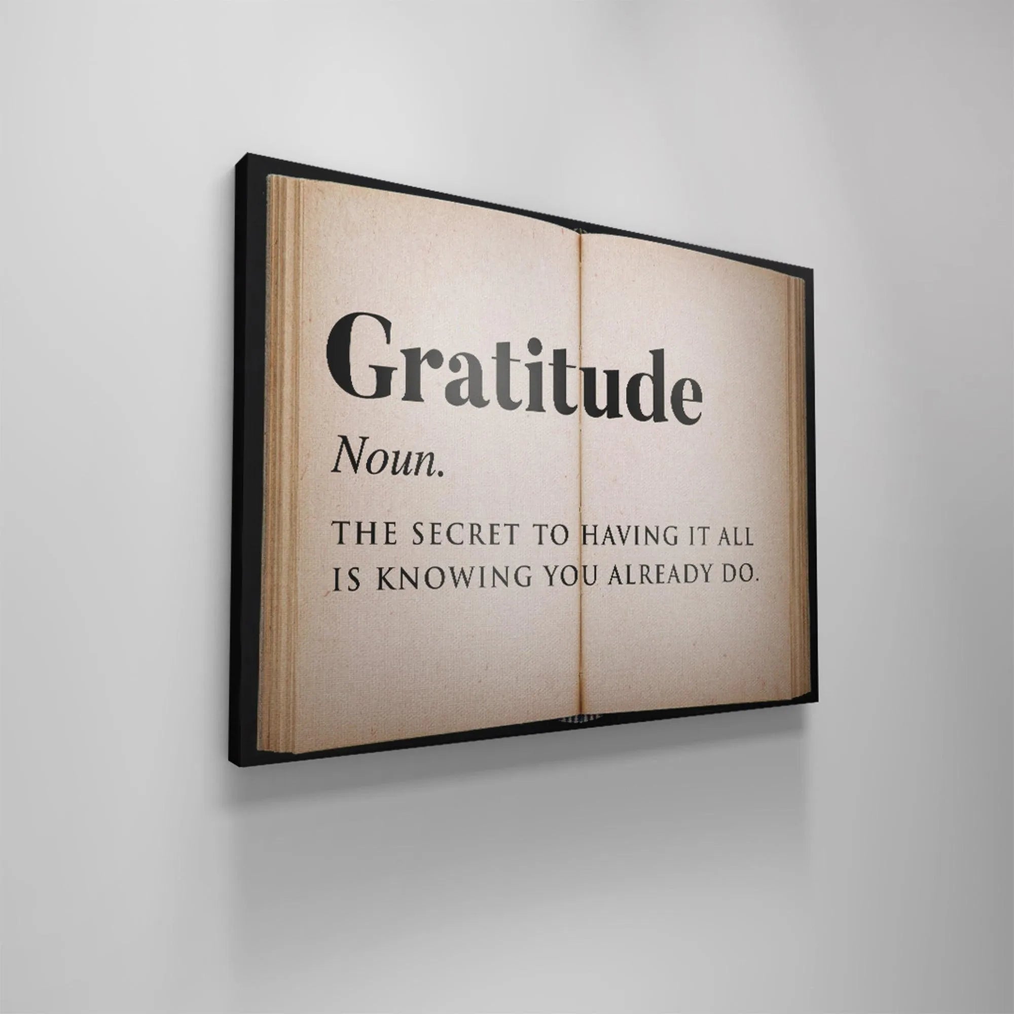 The centered fold and spine area of the pages depicted in the definition style of the Gratitude - Open Book image.