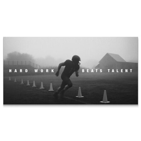 Monochrome athletic print emphasizing the text "Hard Work Beats Talent" above a runner.