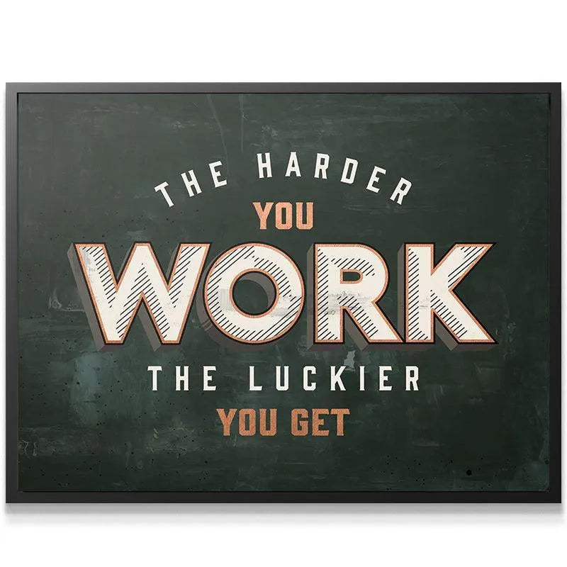 Full view of the motivational wall art stating "The Harder You Work, The Luckier You Get."