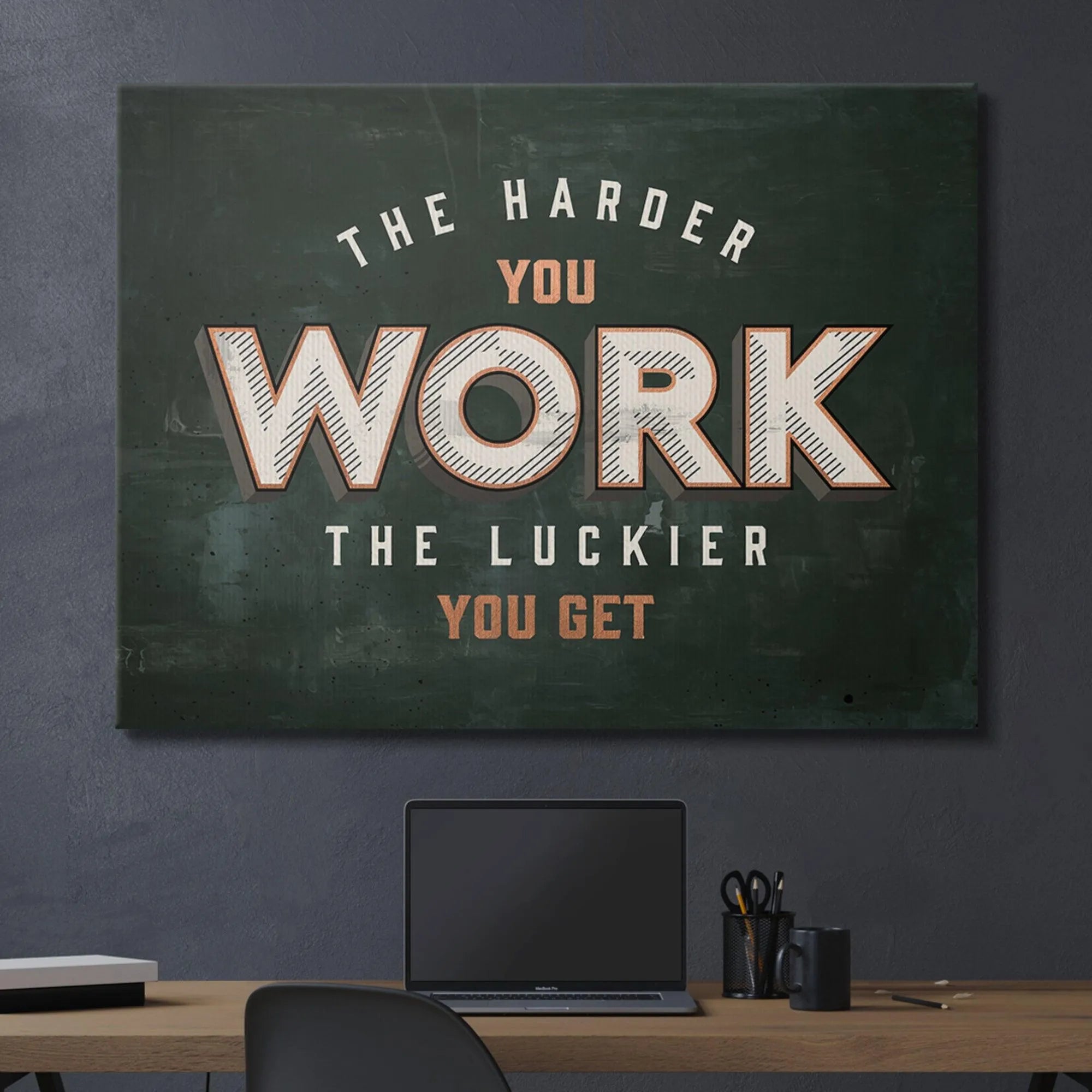 Lifestyle image of the "The Harder You Work" inspirational quote art hanging in a gym workout space.