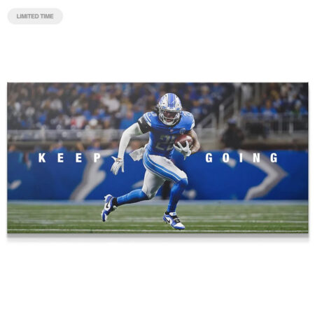 Full canvas view of Jahmyr Gibbs - Keep Going, running mid-field with the football held securely.