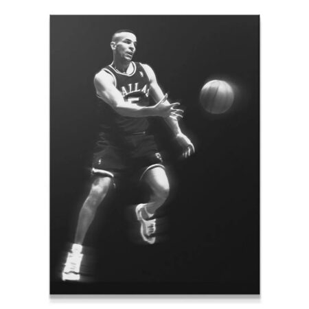 Jason Kidd - #2 captured mid-dribble in high-contrast black and white studio lighting.