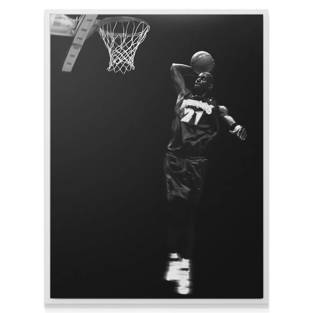 Full vertical view of the powerful Kevin Garnett - #4 canvas print installed in a modern sports memorabilia display.