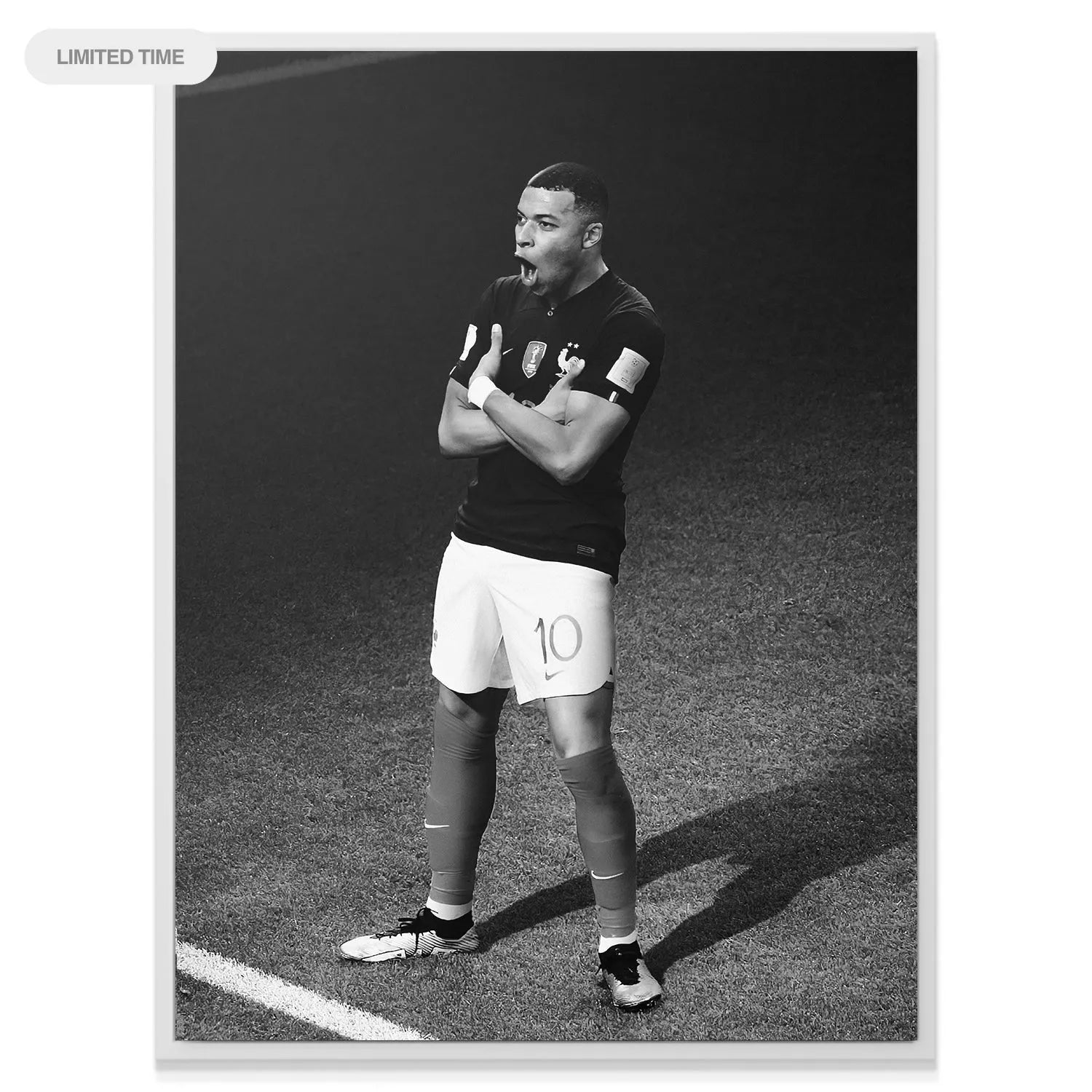 Detail shot showing the striker's arms crossed and defiant stance during the emotional Kylian Mbappe - Celebration.