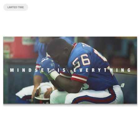 Wide shot of Lawrence Taylor - Mindset Is Everything poster showing LT sitting on the sideline bench after a play.