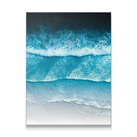 Aerial view of crashing turquoise waves and white foam texture, titled Lay Up.