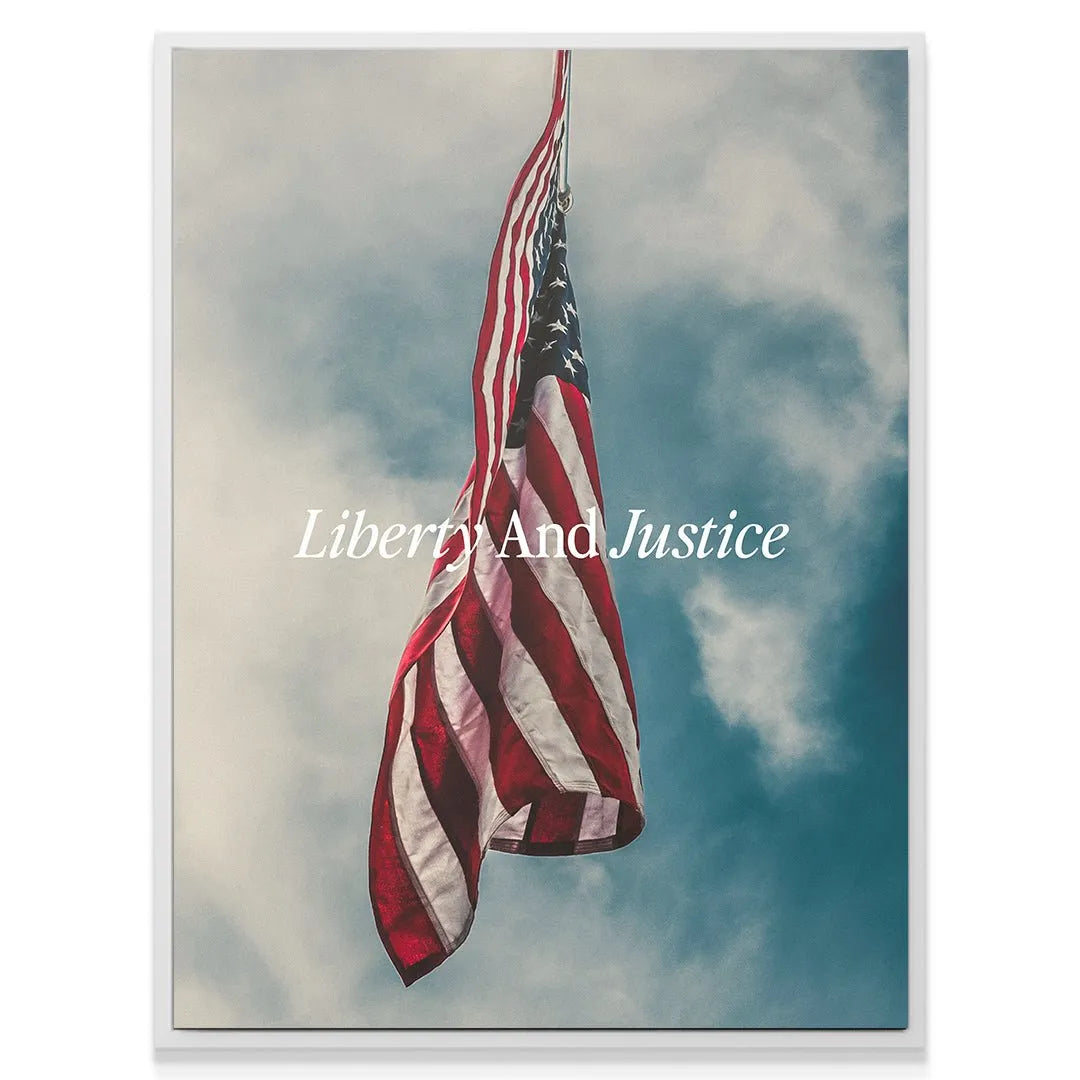 Angled view of the patriotic wall decor, emphasizing the prominent phrase Liberty & Justice on the canvas.