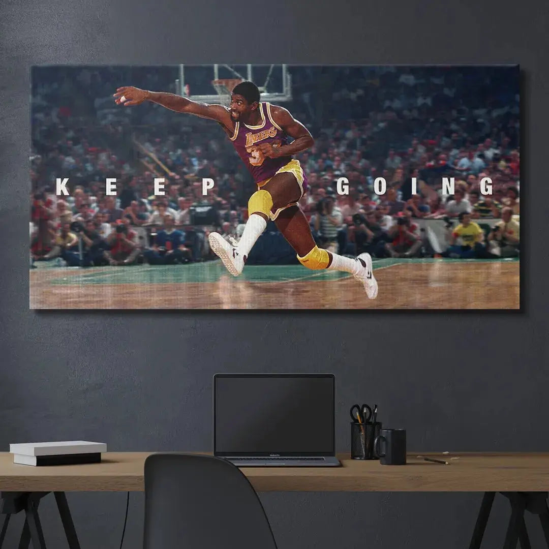 Texture shot focusing on the crisp white lettering of 'Keep Going' overlaid on the Magic Johnson image background.