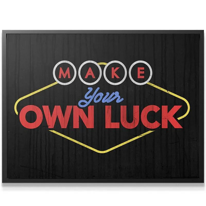 Close-up texture shot of the vintage wood grain background underlying the 'Make Your Own Luck' text on canvas.