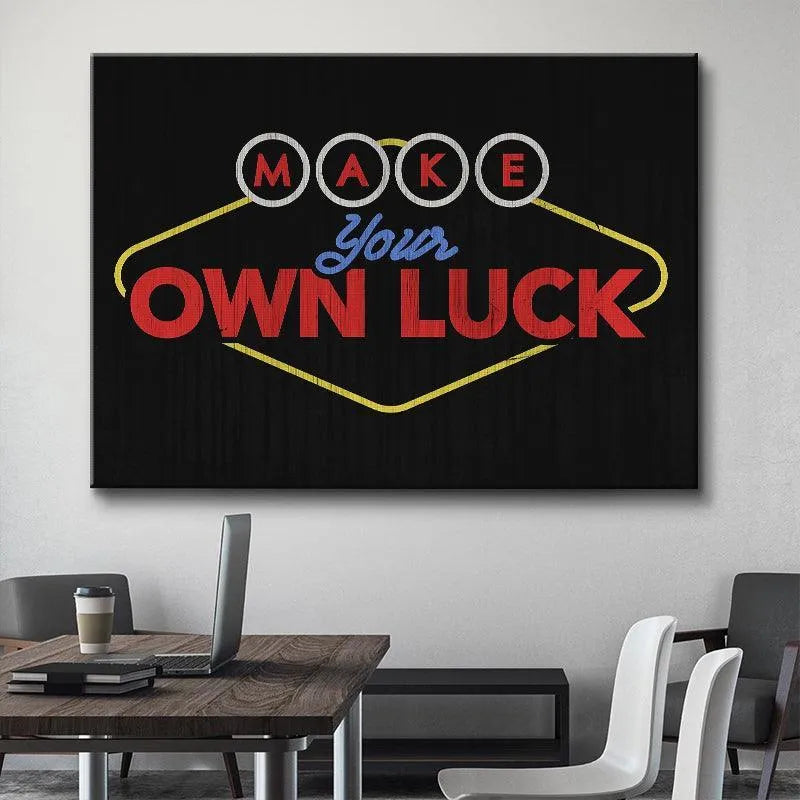 High-angle perspective of the illuminated typography art emphasizing the words 'Make Your Own Luck' and neon effect.