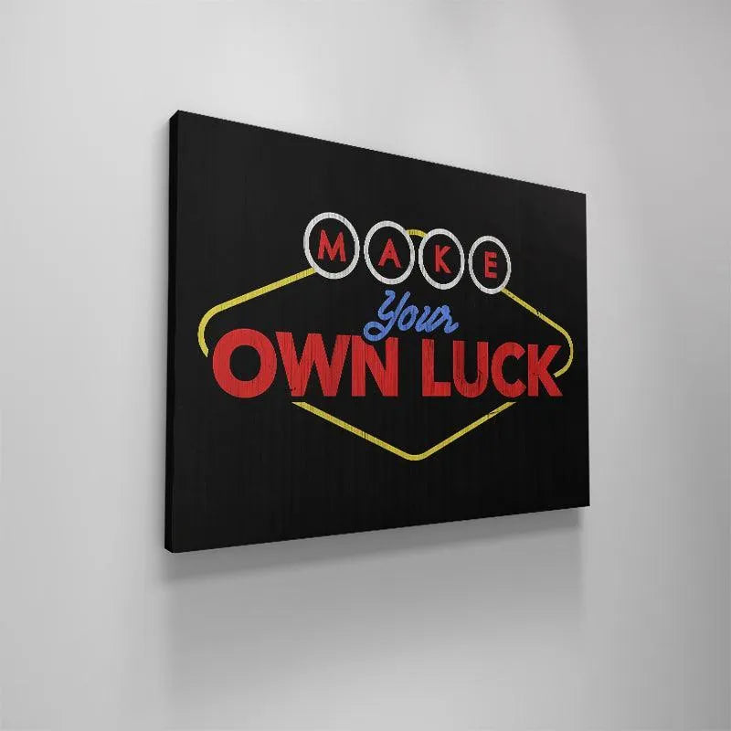 The 'Make Your Own Luck' print displayed against a brick wall, showcasing its large scale and visual impact.