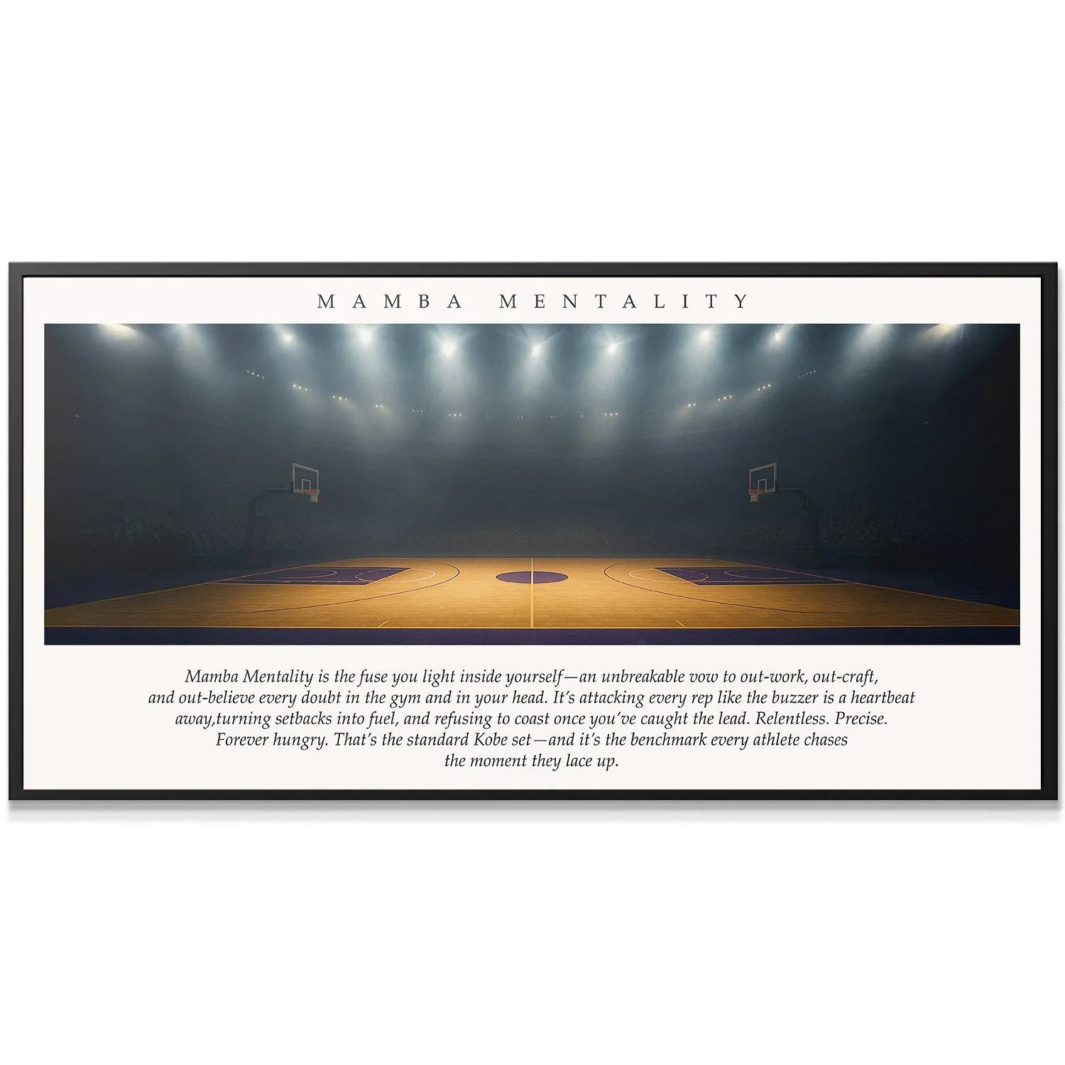 Wide-angle image of the dramatically lit, empty basketball court embodying the Mamba Mentality work ethic.