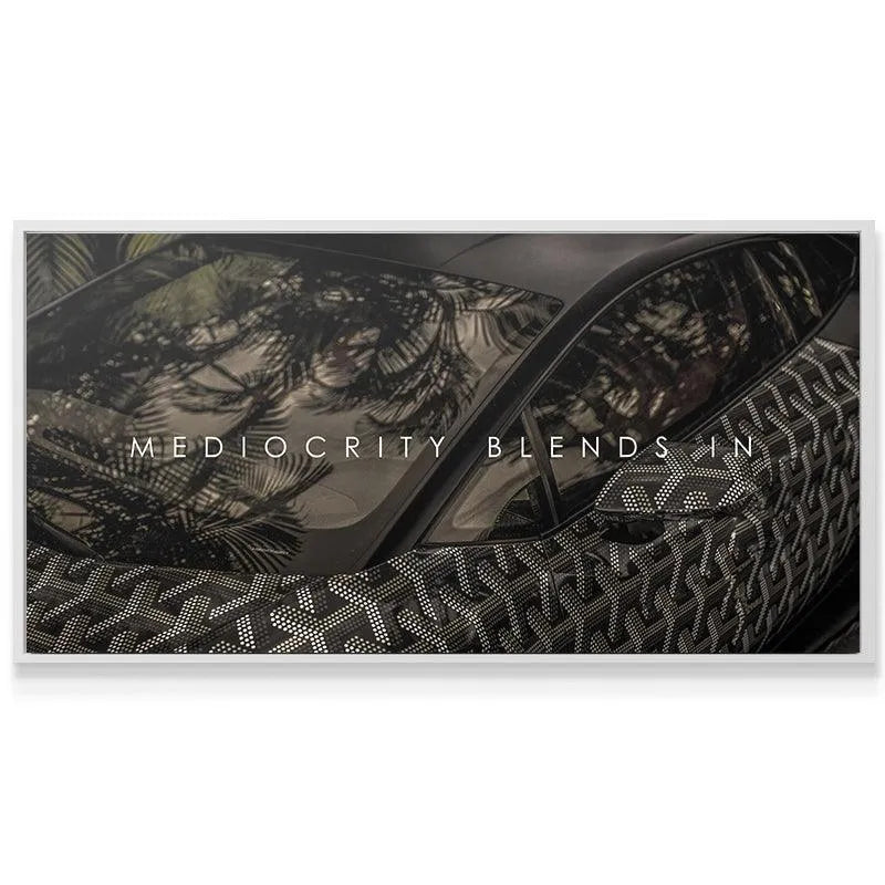 High-resolution canvas print detail showing the text 'Mediocracy Blends In' on the vehicle glass.