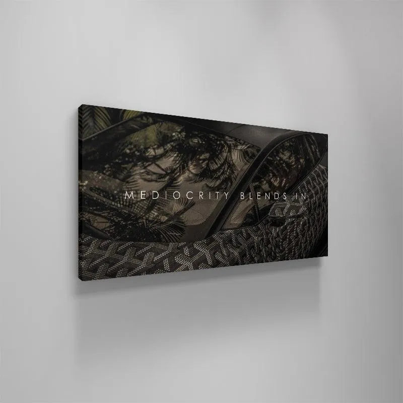 Luxury lifestyle decor image of a custom wrapped car promoting the message 'Mediocracy Blends In'.