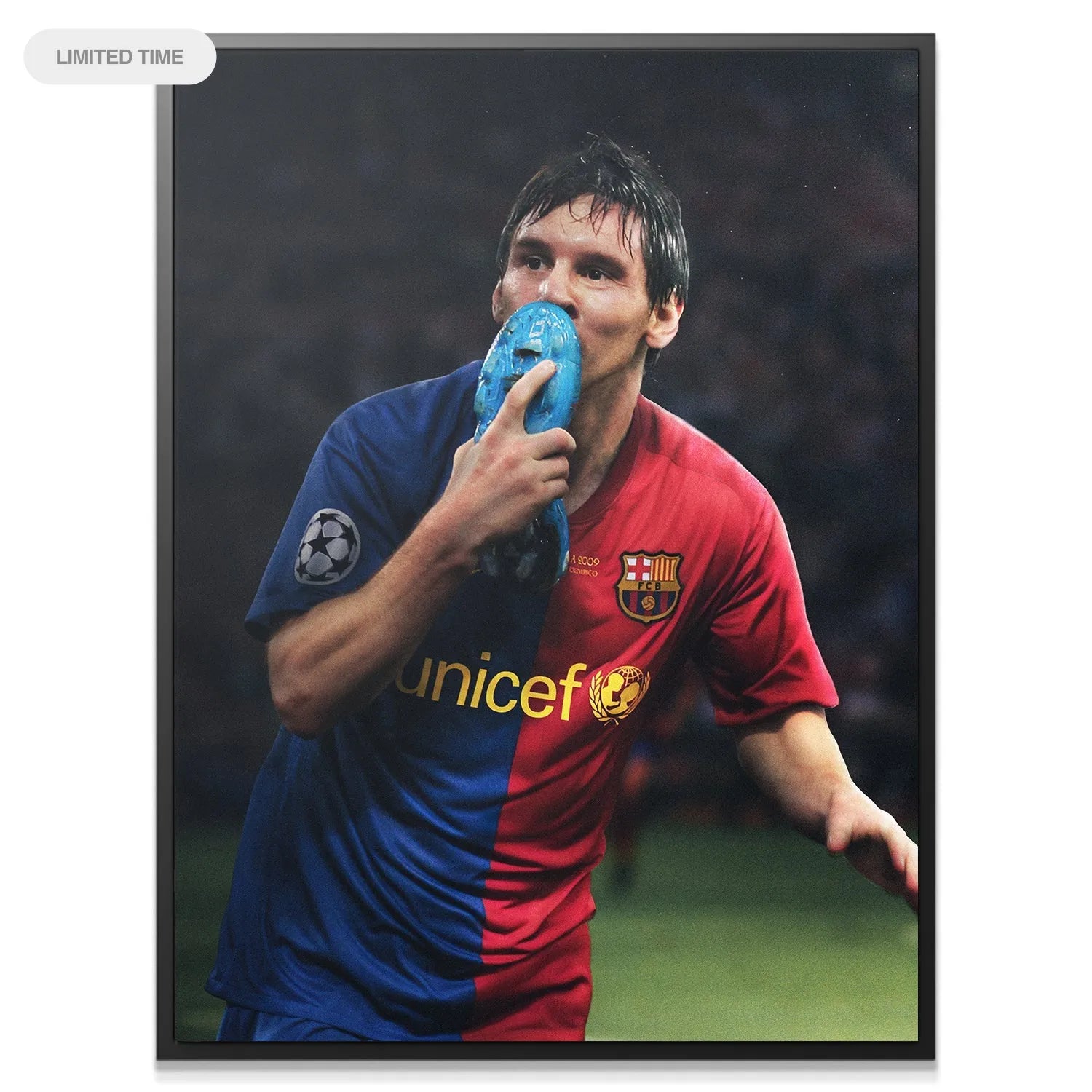 High-angle shot of the legendary soccer star performing the Messi - Boot Kiss on the championship pitch.