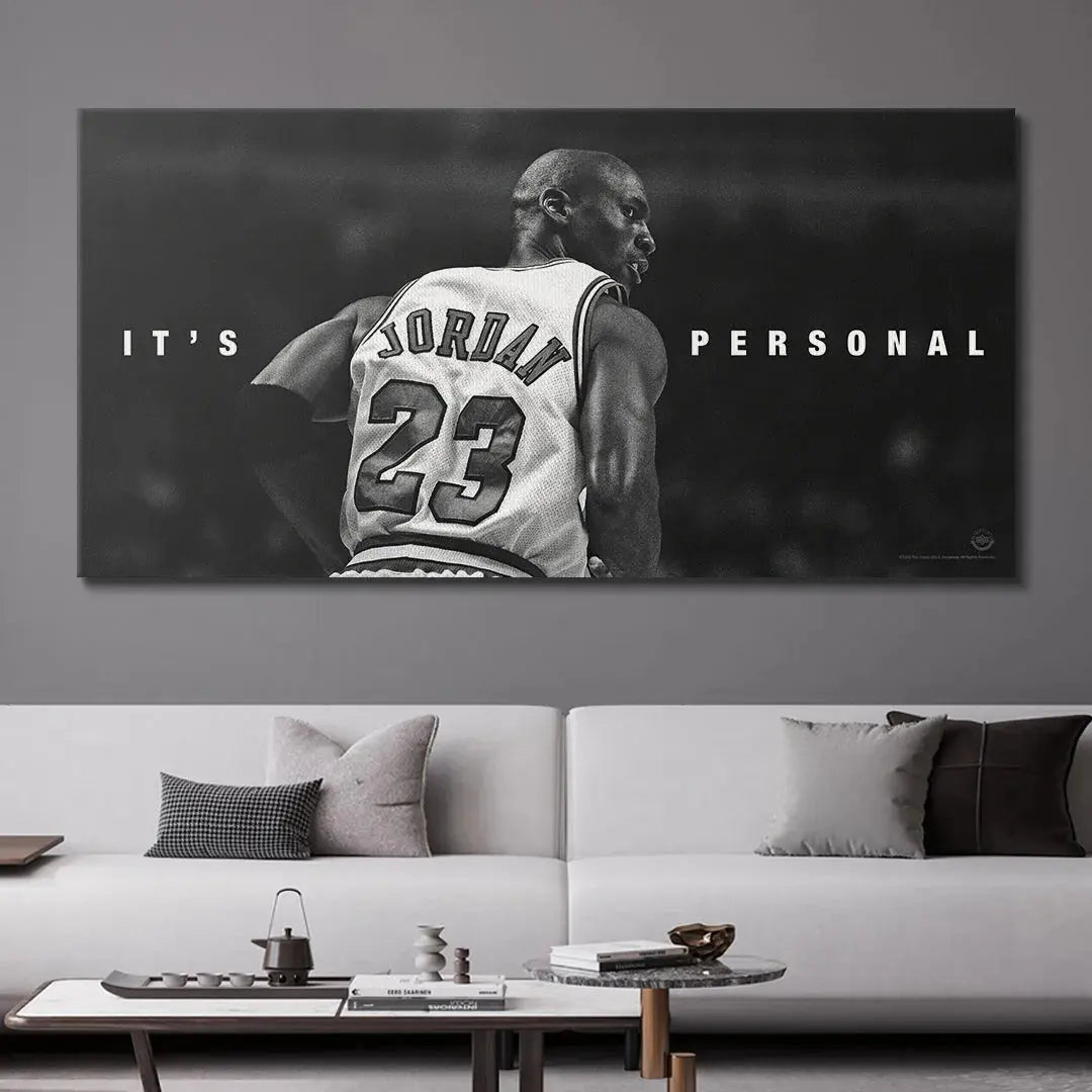 Lifestyle mock-up of the large framed artwork 'Michael Jordan - It's Personal' hanging in a modern apartment setting.
