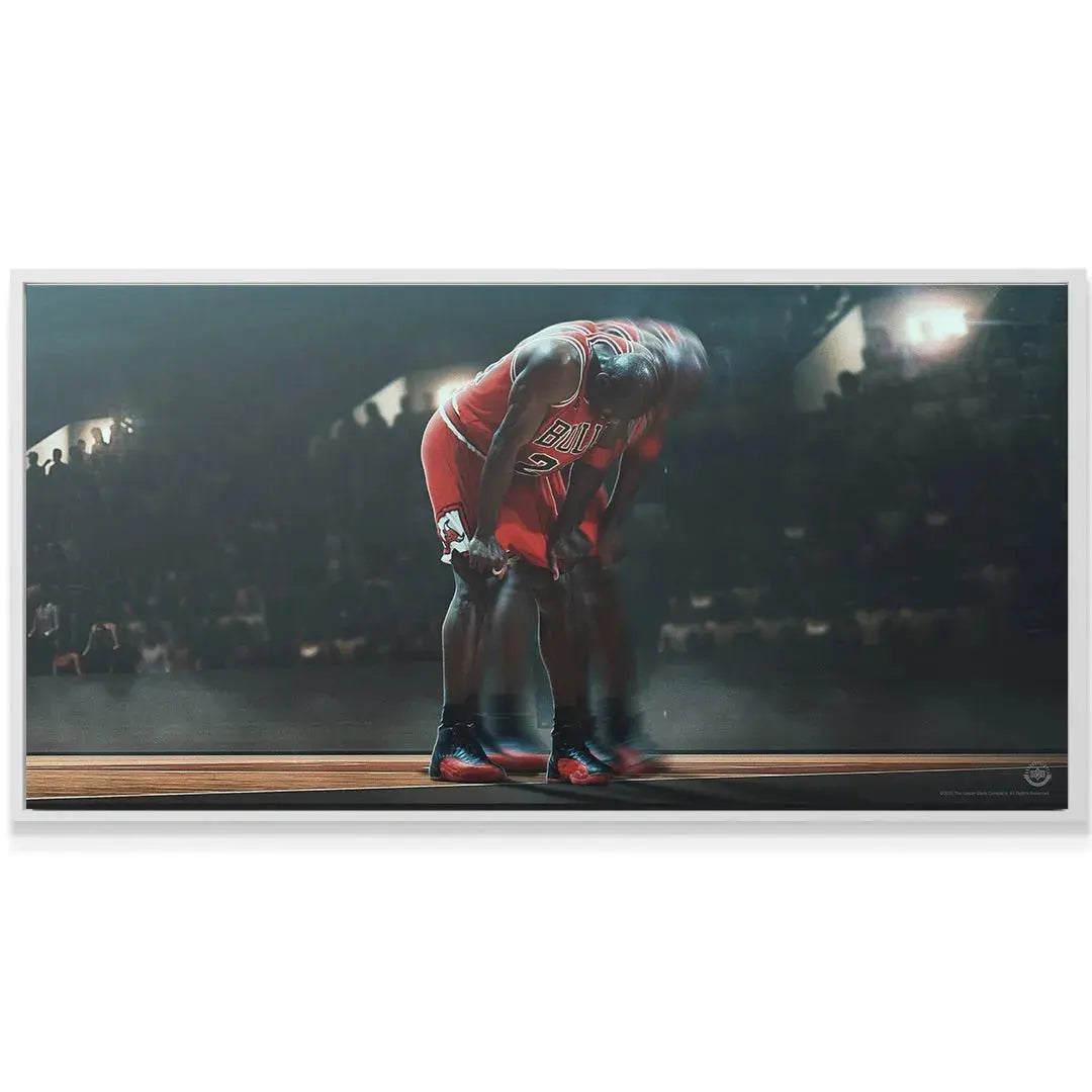 Low angle shot focusing on MJ's black and red sneakers and the wooden court floor in 'Michael Jordan - Keep Going (No Quote)'.