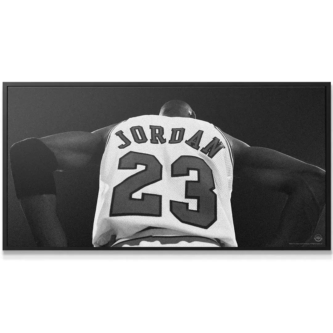 Close-up, low-angle shot of Jordan's shoulders and jersey in the Michael Jordan - Larger Than Life artwork.