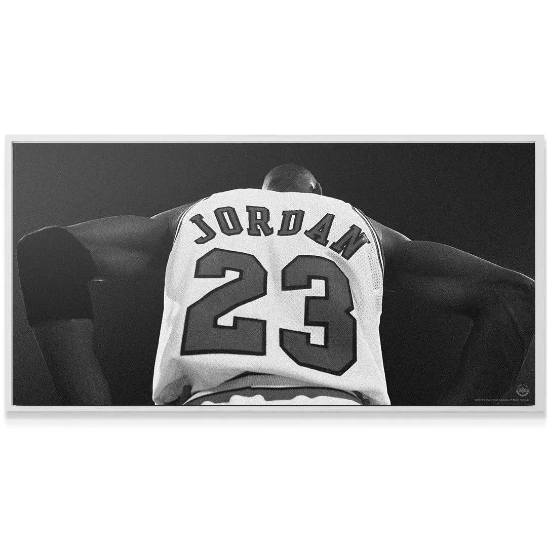 Dramatic black and white photograph of 'JORDAN 23' highlighting contrast in Michael Jordan - Larger Than Life.