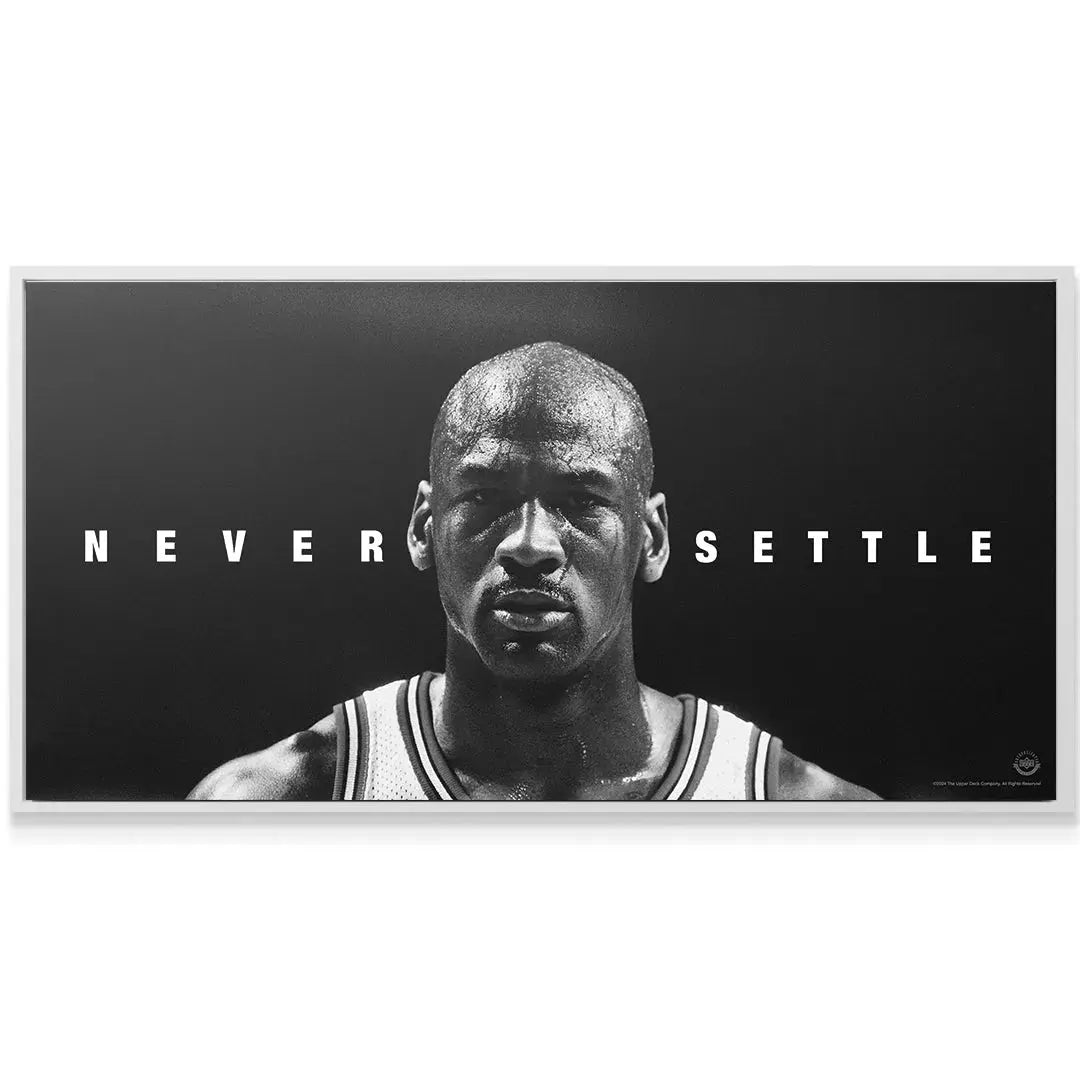 Wide view of the horizontal Michael Jordan - Never Settle motivational poster displayed prominently on a wall.
