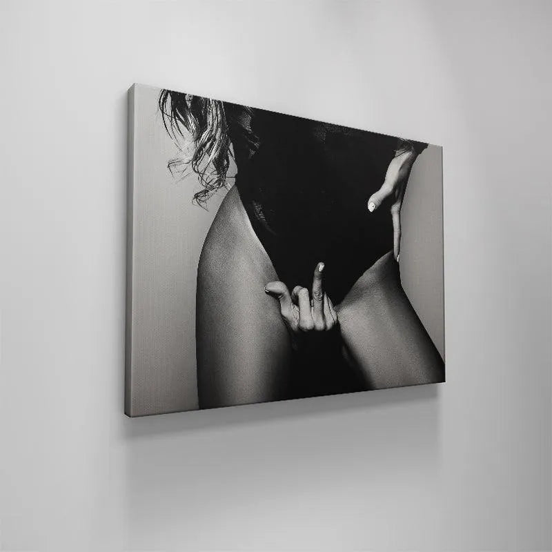 Soft side lighting illuminating the thigh and hip contour in the provocative 'Mind Your business' studio shot.