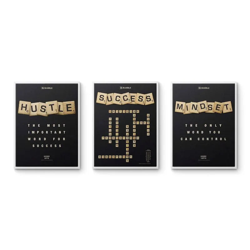 Angled shot of the three mounted canvas prints in the Scrabble Bundle against a modern minimalist wall.