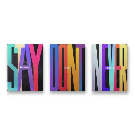 Full view of the three-piece motivational Stand Out Bundle canvas art set featuring bold colored text on a dark backdrop.
