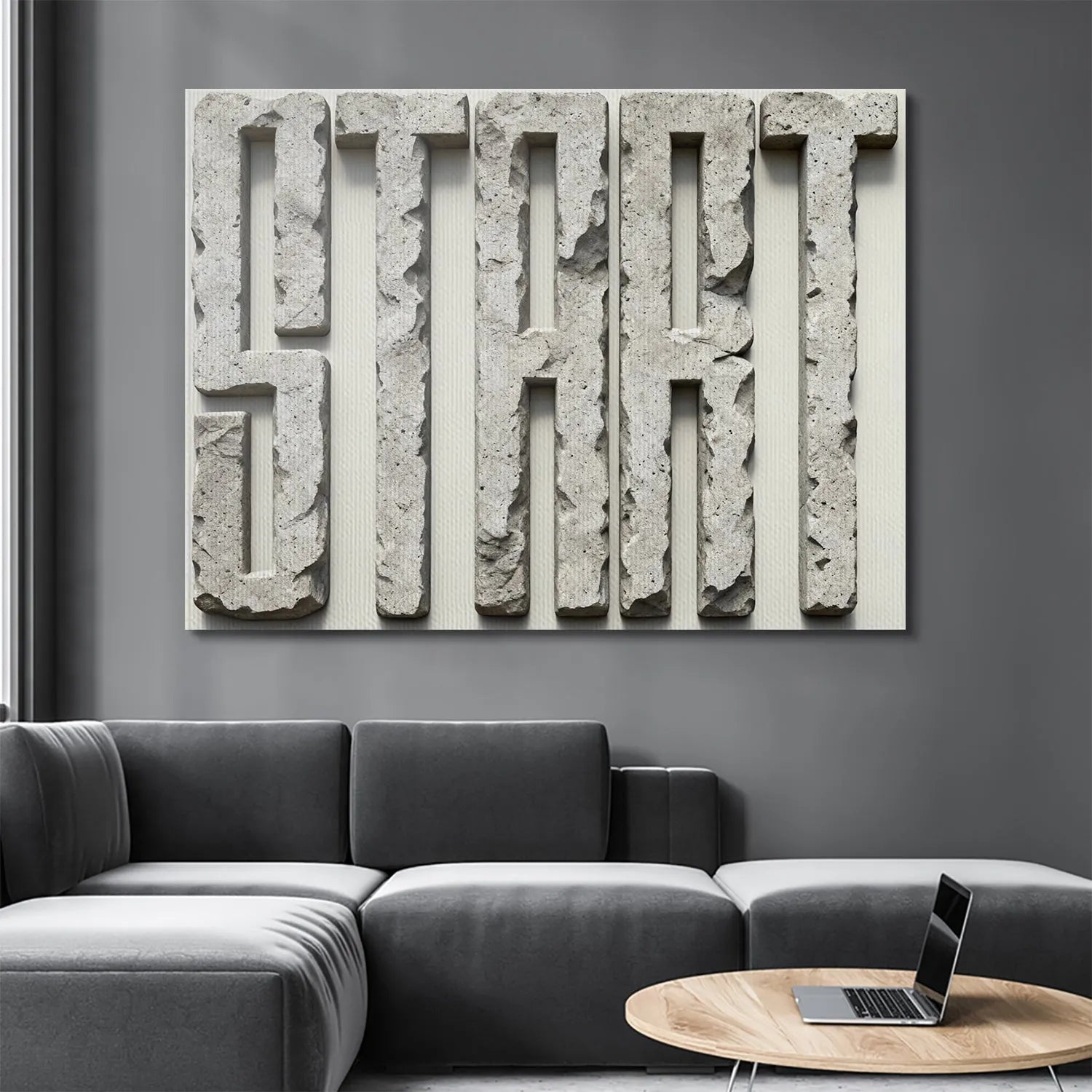 Full vertical orientation display of the monumental Start - Stone sculpture against a white wall.