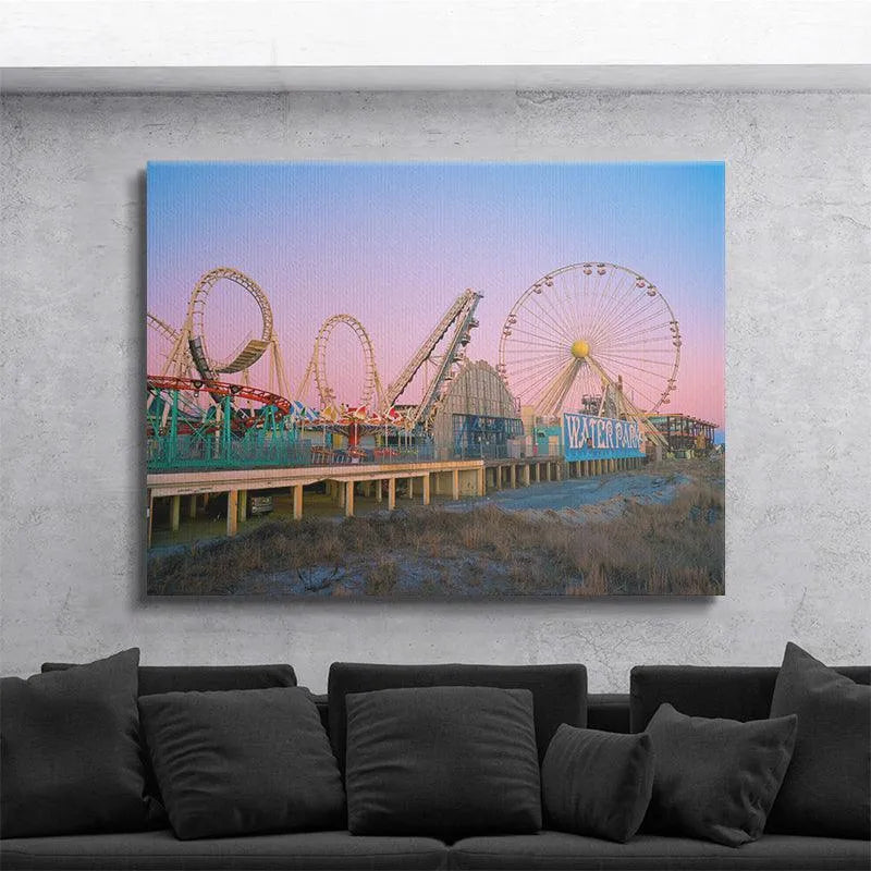 Low angle perspective showing the 'WATER PARK' sign structure beneath the coaster in Summers Down the Shore.
