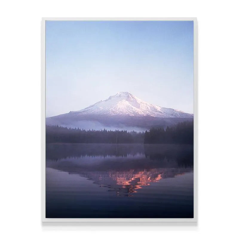 Low-angle perspective emphasizing the vastness of the pale blue sky above the mountain in Sunrise at Mt.Hood.