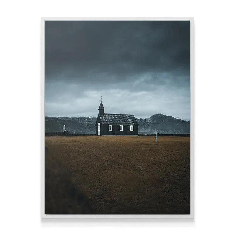 Architectural close-up highlighting the wooden texture of The Black Church facade in Iceland.
